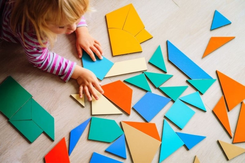 child at daycare with blocks, 7 Money saving tips when moving to Portland OR, Real Agent Now