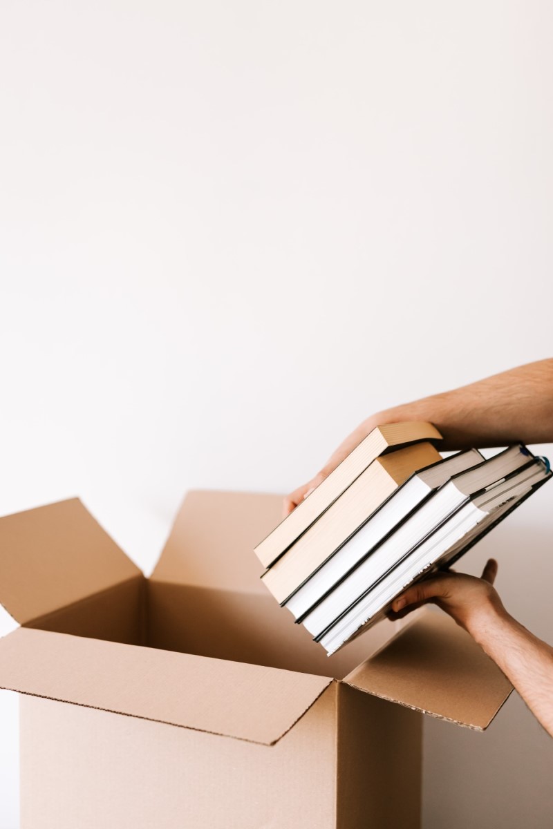 packing books, 7 Money saving tips when moving to Portland OR, Real Agent Now