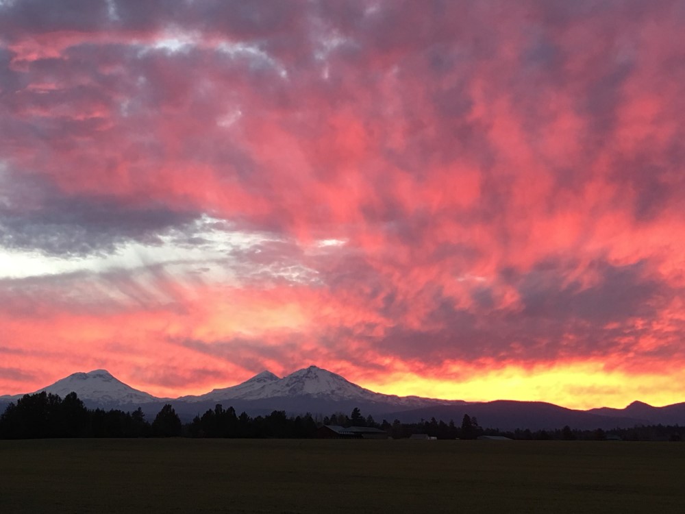 sunset over Bend OR, cost of living in Bend Oregon (1)