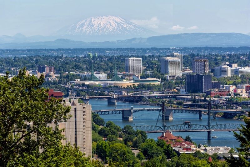 view of Portland Oregon bridges on the Willamette River, How much does it cost to live in Portland Oregon